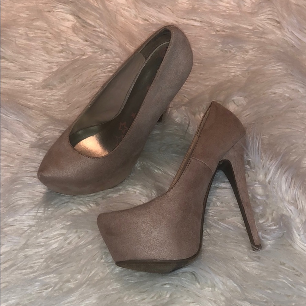 Tall tan pumps